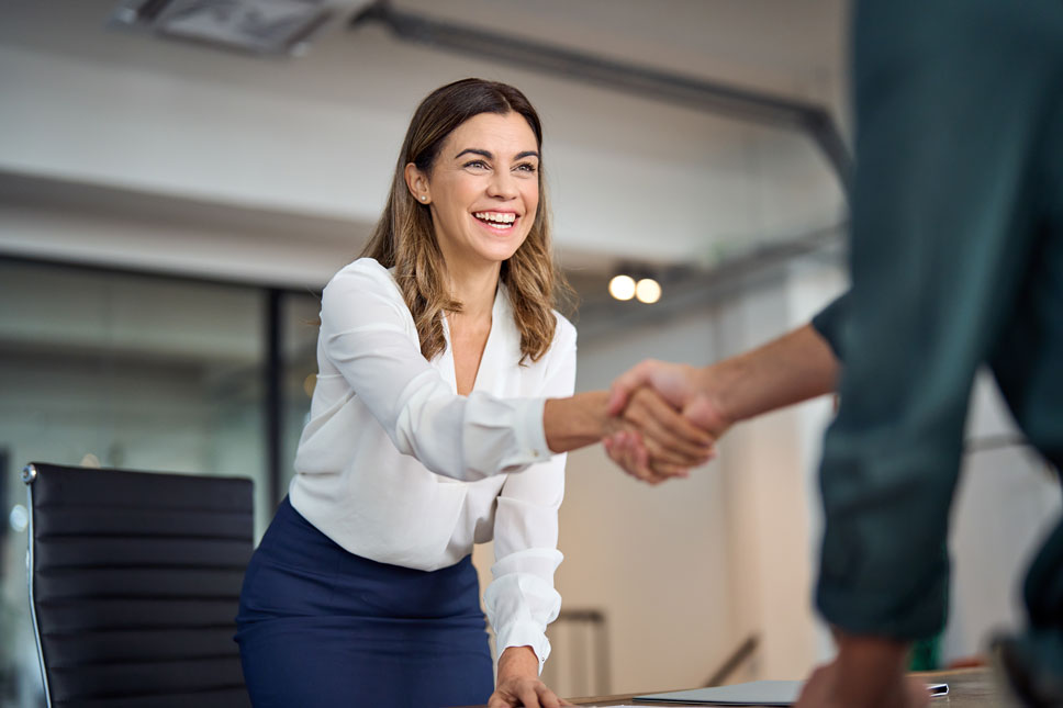 shaking hands with recruiter.
